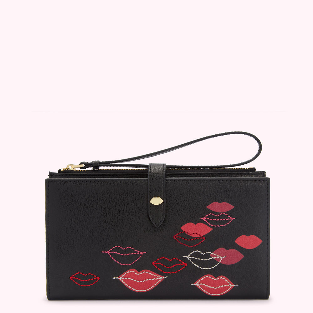 Black leather wallet with a wrist strap and embroidered lips in shades of pink and red.