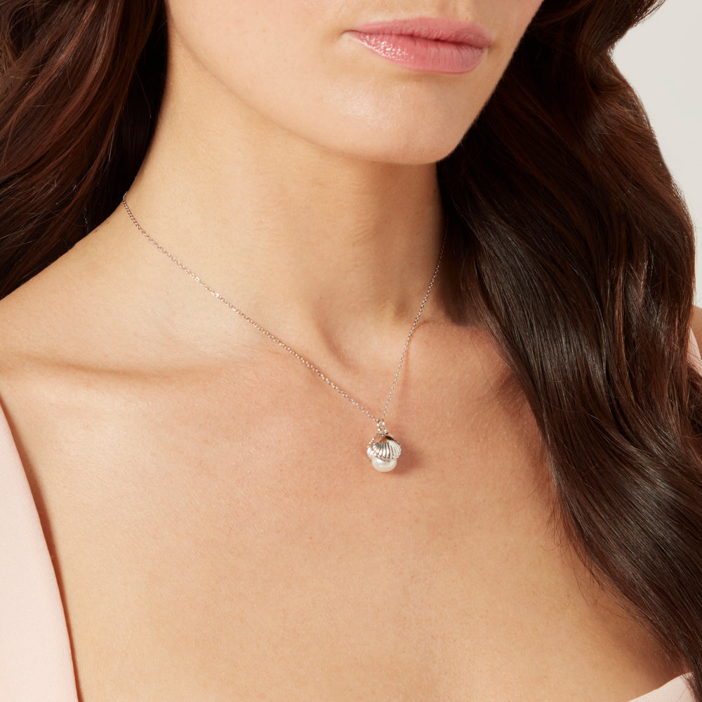 Model with dark hair wearing a sterling silver