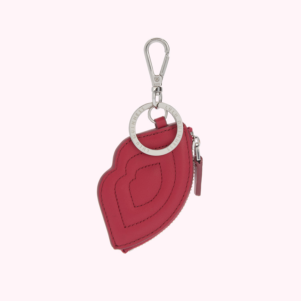Red leather Lulu Guinness lip-shaped coin purse keychain with silver-tone hardware.