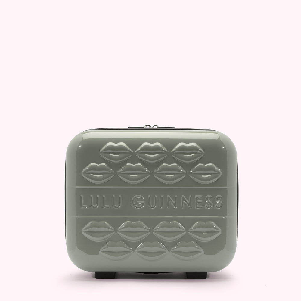 Sage green Lulu Guinness makeup case with embossed lips.