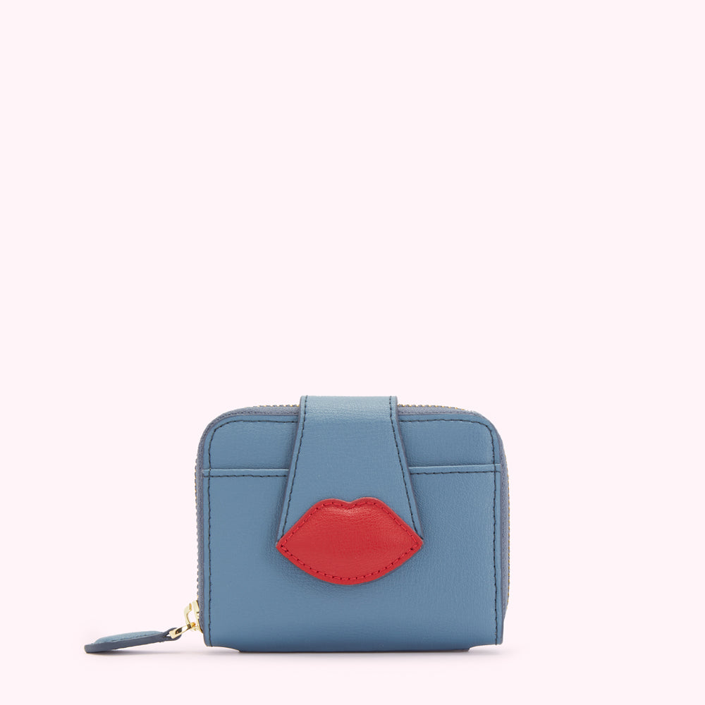 Blue leather wallet with a red lip detail.