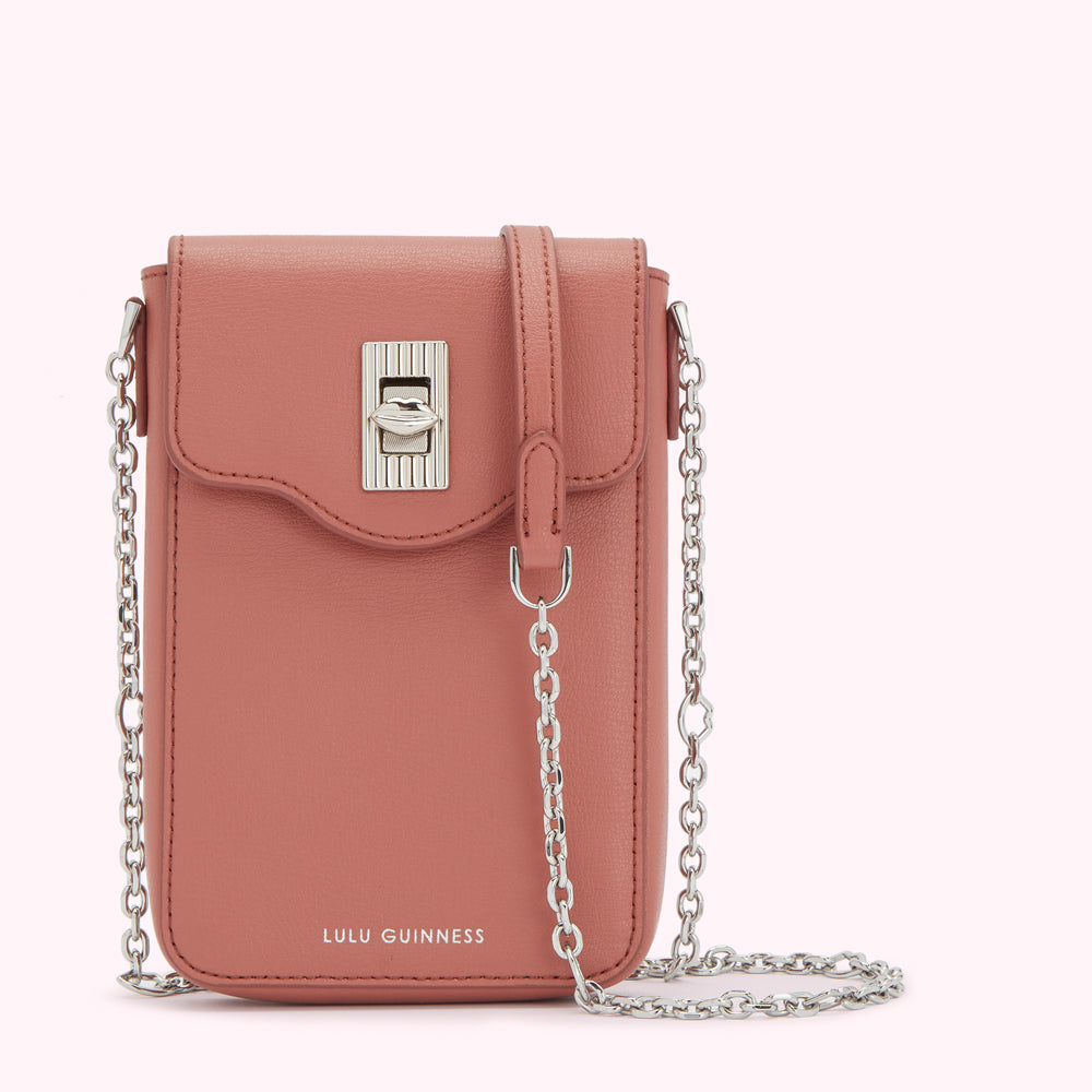 Dusty rose Lulu Guinness crossbody bag with silver chain strap and clasp.