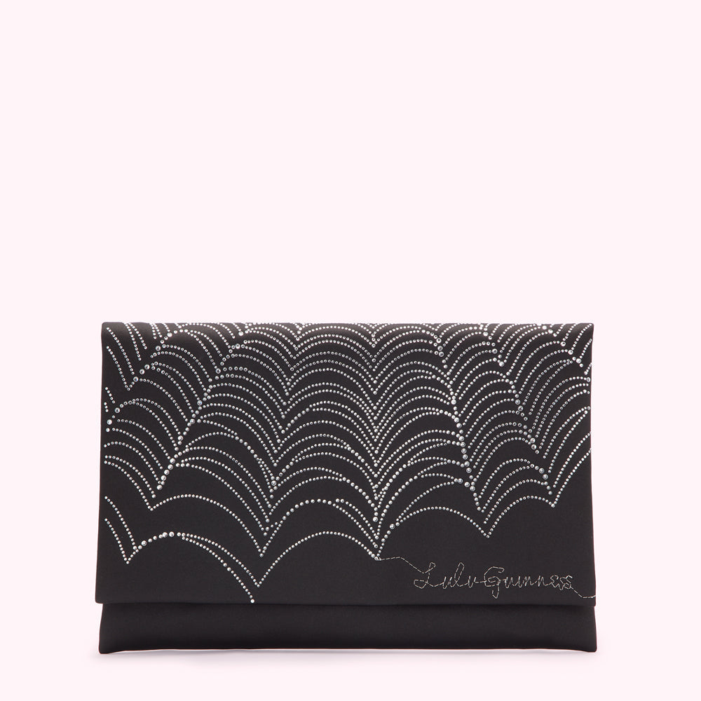 Black clutch with silver embellishments in an arc pattern, Lili G Guinness logo.