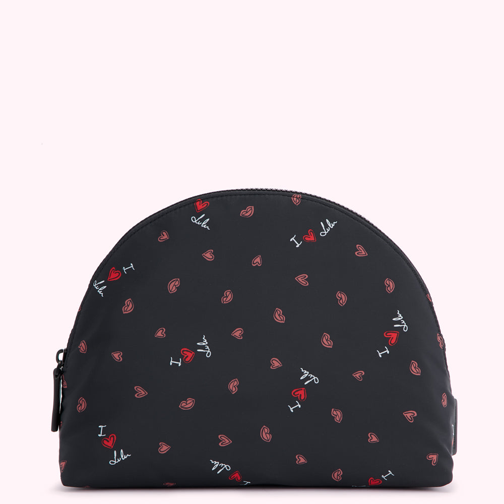 Black half-moon shaped cosmetic bag with a repeating pattern of red hearts, pink lips, and the text "I love Lulu" in white.