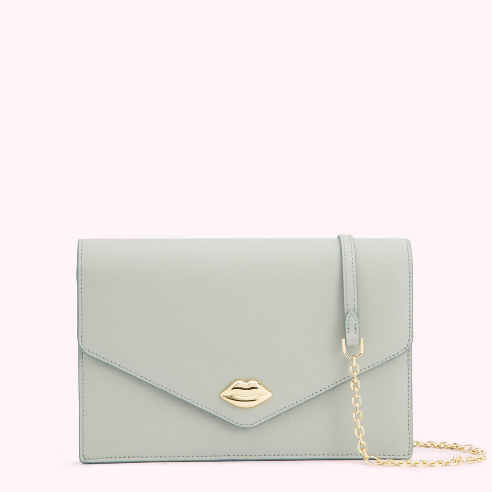 Light teal leather clutch with gold lip detail and chain strap.