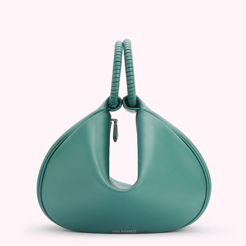 Teal Lulu Guinness handbag with a unique shape and twisted top handles.