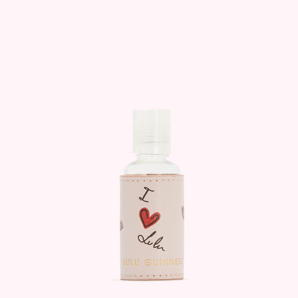A pale pink Lulu Guinness hand sanitizer bottle with the words "I love Dublin" and a red heart.