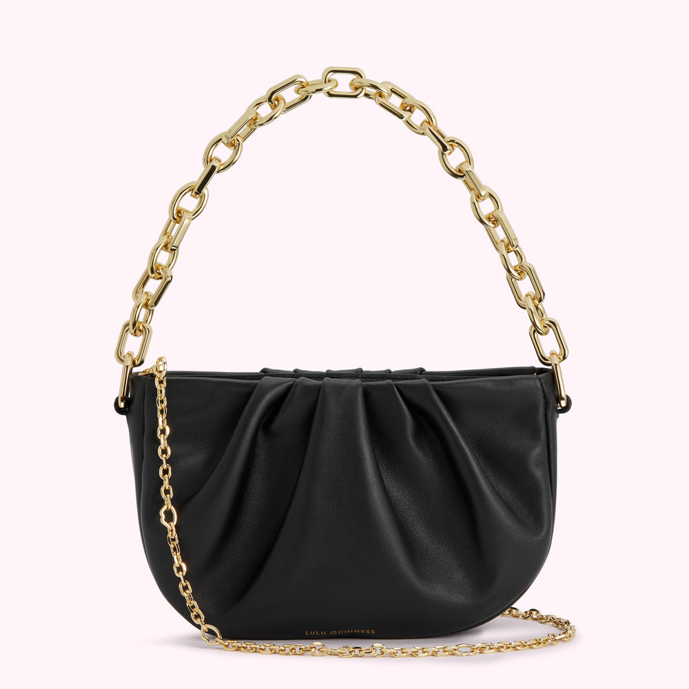 Black Lulu Guinness pleated leather handbag with gold chain strap.