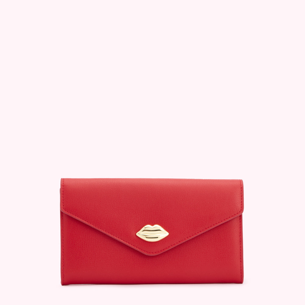 Red leather wallet with gold lip detail.