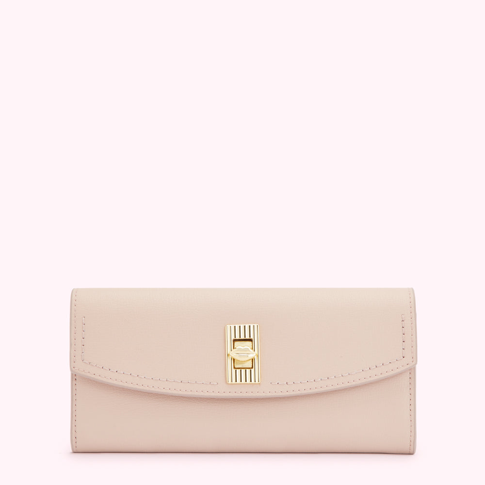 A blush pink leather wallet with a gold clasp.