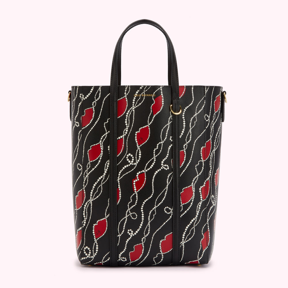 Black tote bag with red lips and pearl accents.