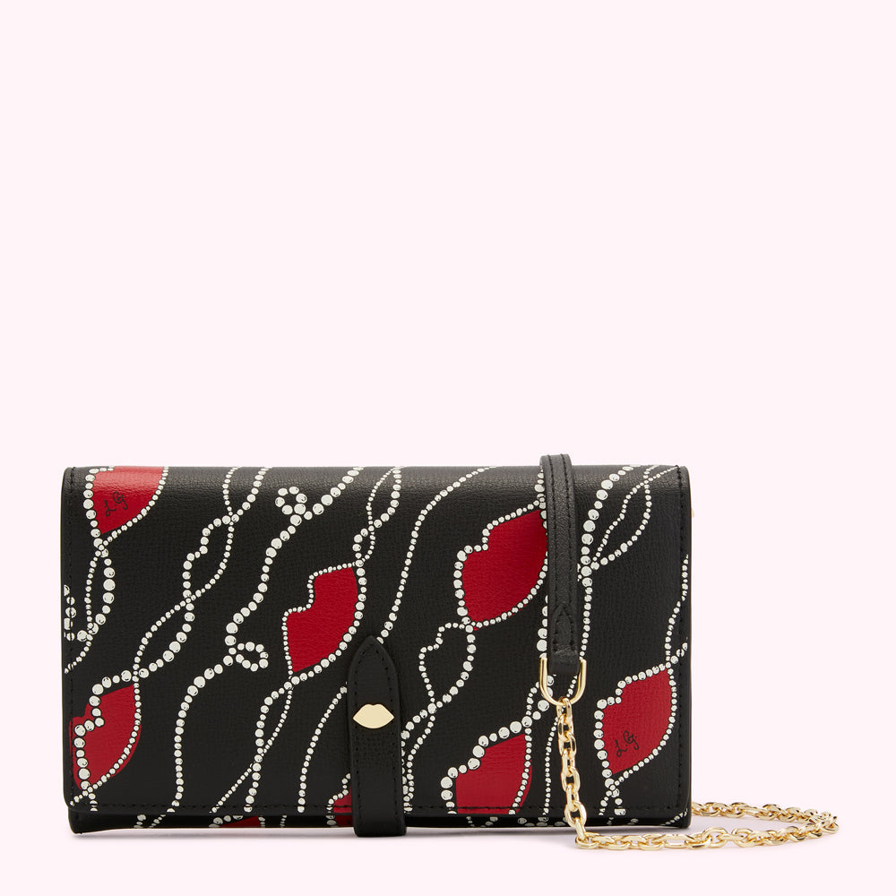 Black leather wallet with red lips and pearl details, gold chain strap.