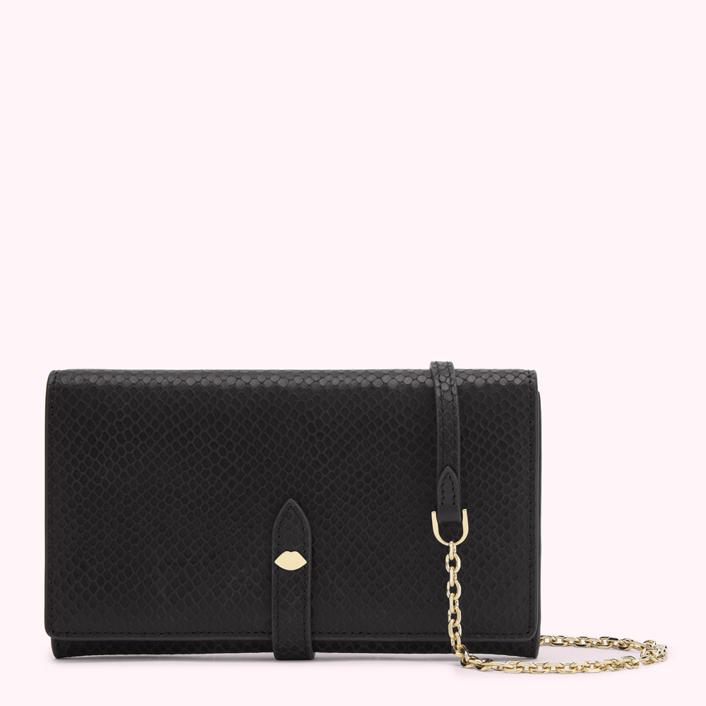 Black snakeskin-textured leather wallet with gold chain and lip-shaped detail.