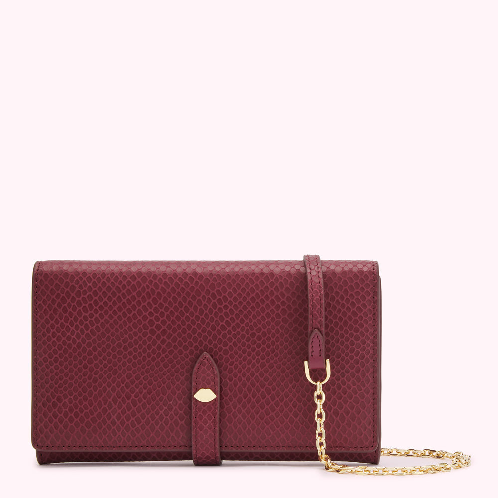Burgundy snakeskin-embossed leather wallet with a gold chain strap and a gold lip detail.