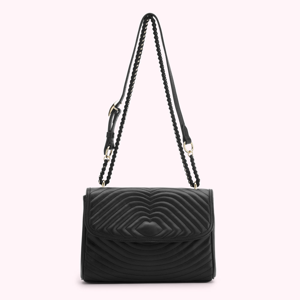 Black quilted crossbody bag with gold chain strap.