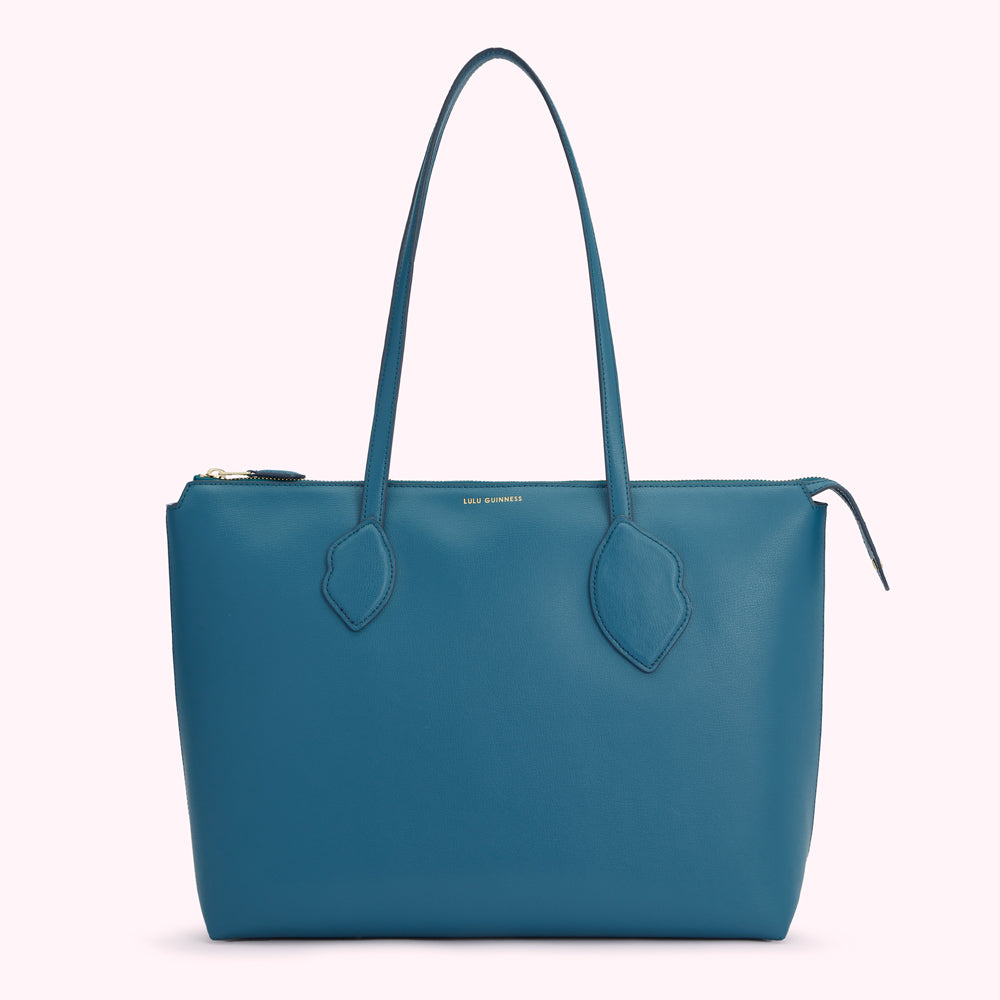 Teal Lulu Guinness tote bag with gold zipper and logo.