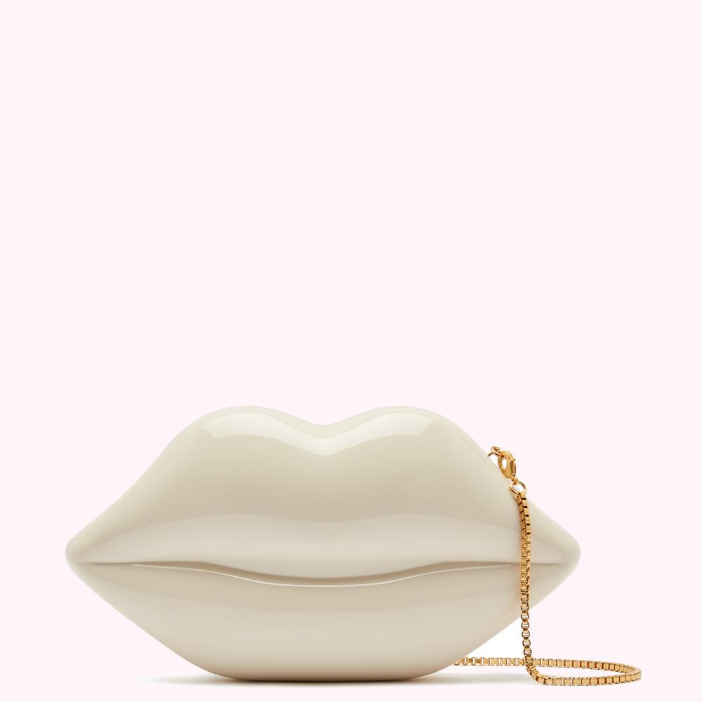 Off-white lip-shaped clutch with gold chain strap.