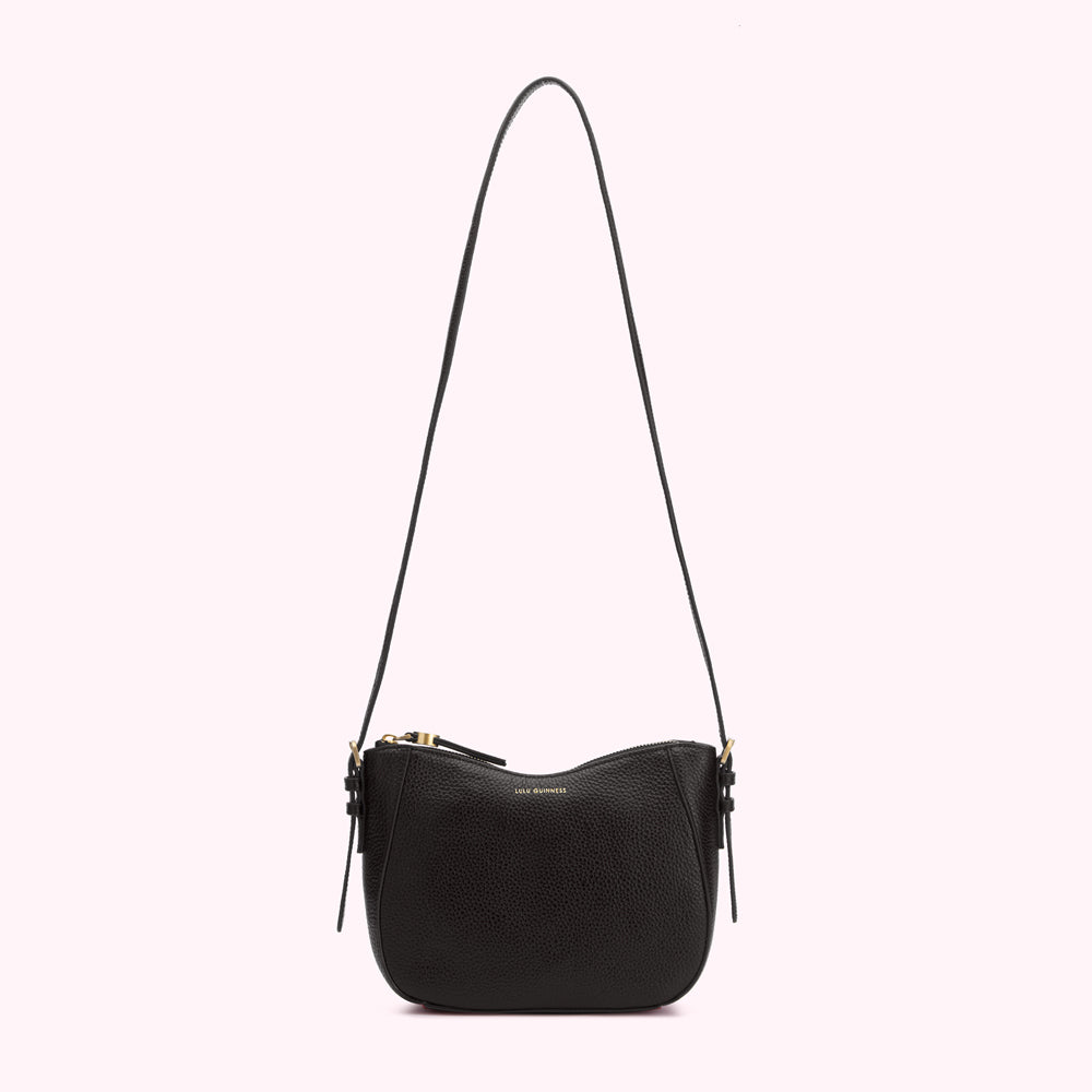 Black crossbody bag with gold zipper and Lulu Guinness logo.