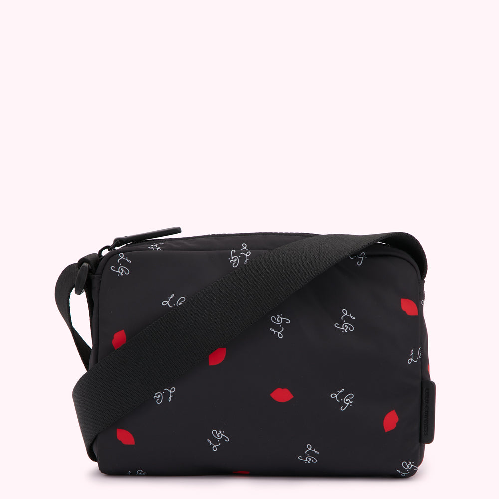 Black crossbody bag with red lips and LG logo print.