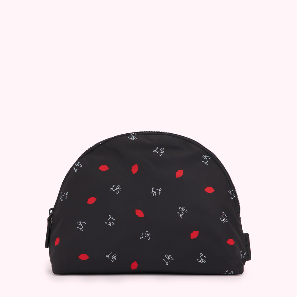 Black half-moon shaped cosmetic bag with a red lips and white L.G. logo pattern.