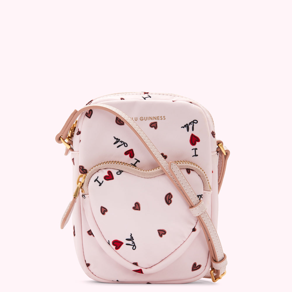 Pink crossbody bag with heart print and "I love Lulu" text.