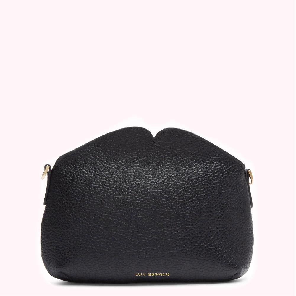 Black Lulu Guinness Lips crossbody bag on a white background.