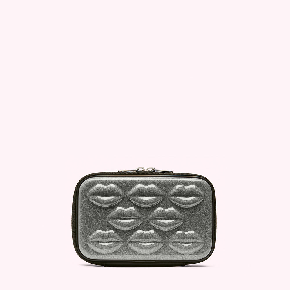 Silver glitter makeup bag with embossed lips.