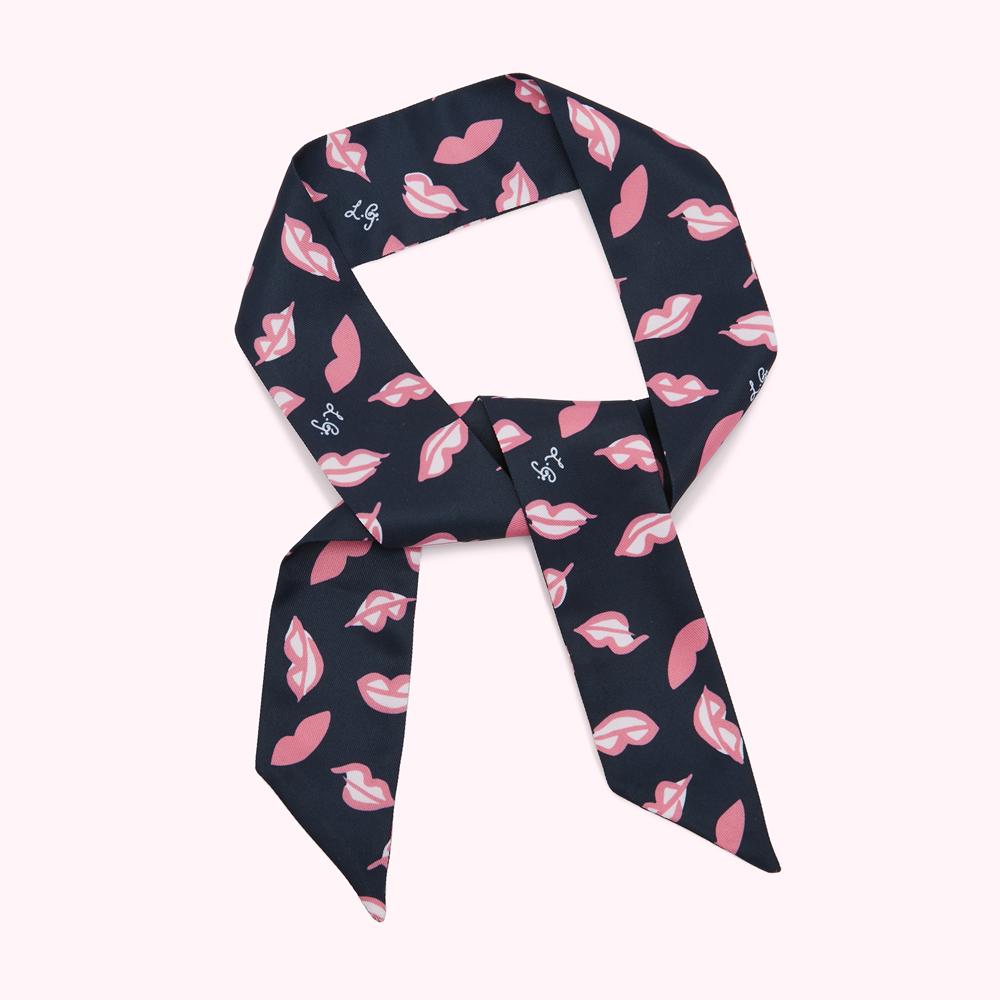 Navy blue silk scarf with pink lips print.