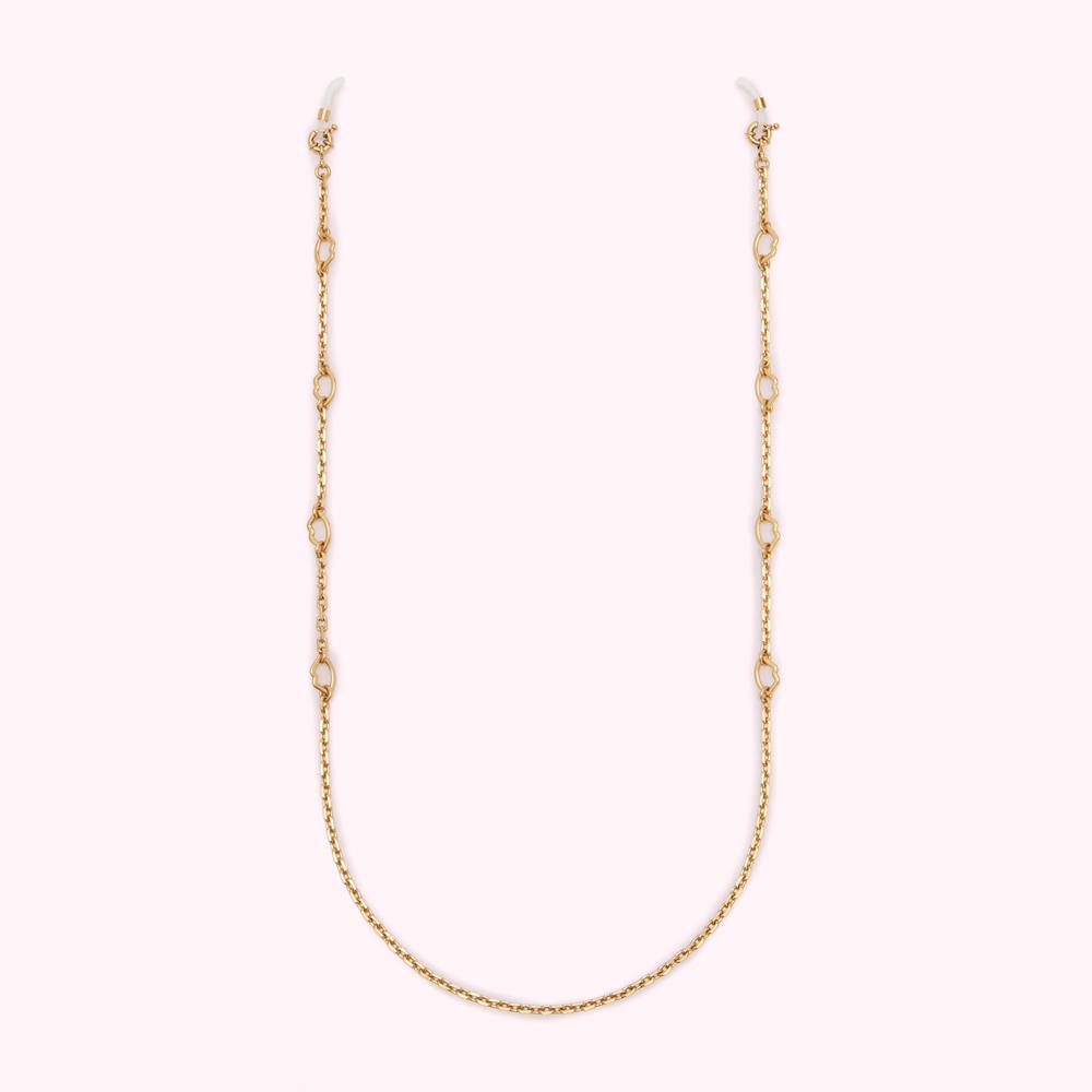 Gold eyeglasses chain with small decorative links against a white background.