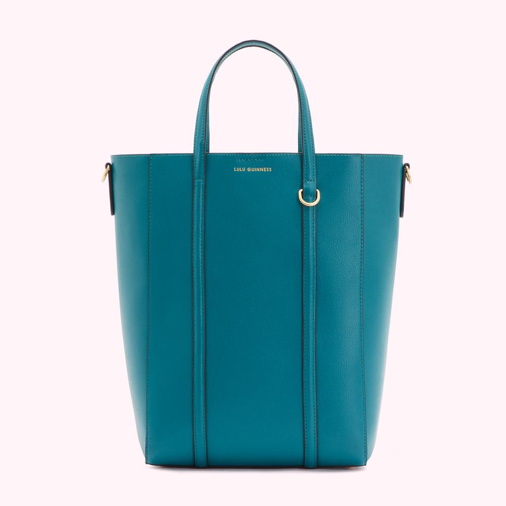 Teal Lulu Guinness tote bag with gold accents.
