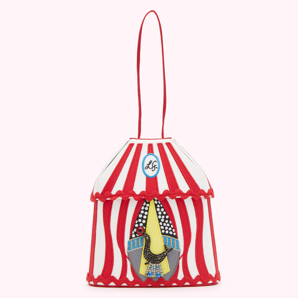 Red and white striped circus tent-shaped handbag with embroidered bird detail.