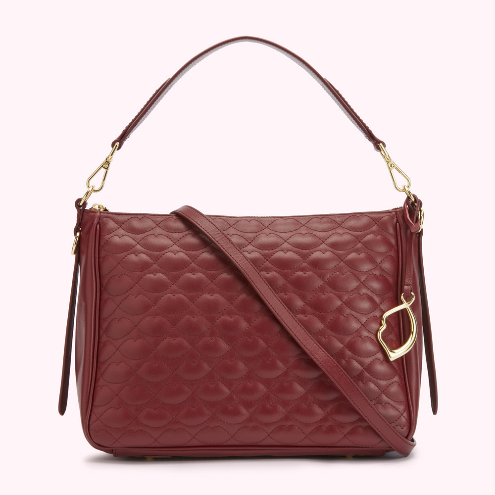 Burgundy quilted leather crossbody bag with gold-tone hardware.