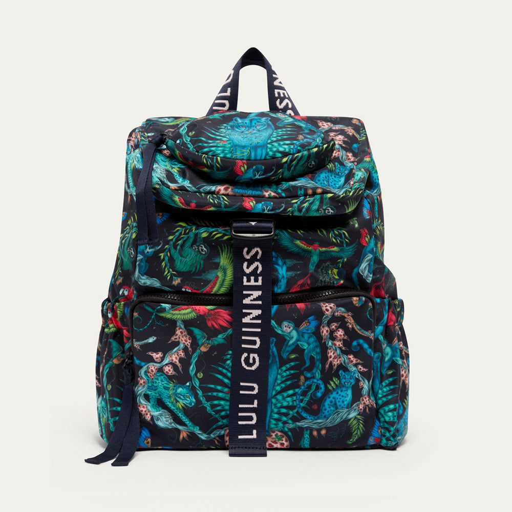 Colorful backpack  by Lulu Guinness x Emma Shipley with floral pattern and 'Lulu Guinness' branding on a white background
