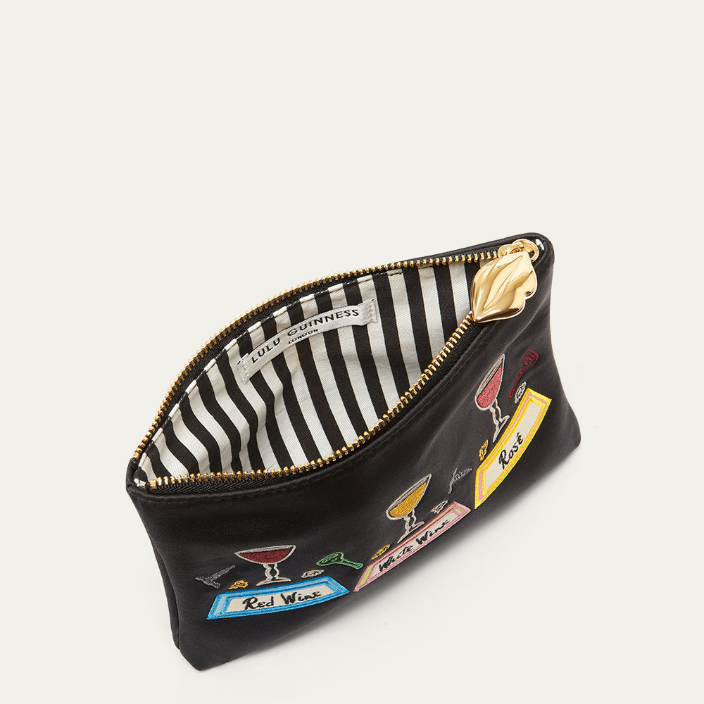 Black pouch with cocktail-themed designs on a white background