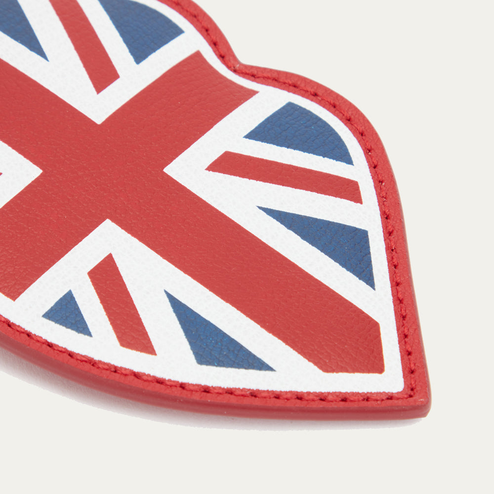 Lip-shaped luggage tag with a Union Jack design on a light background