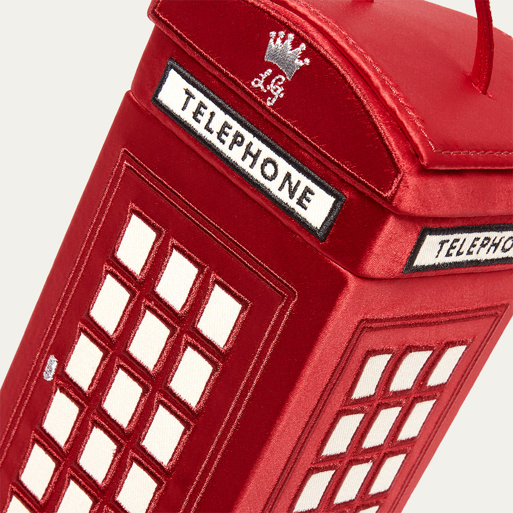 Red telephone box-shaped bag with 'LG' logo and 'TELEPHONE' label on a white background