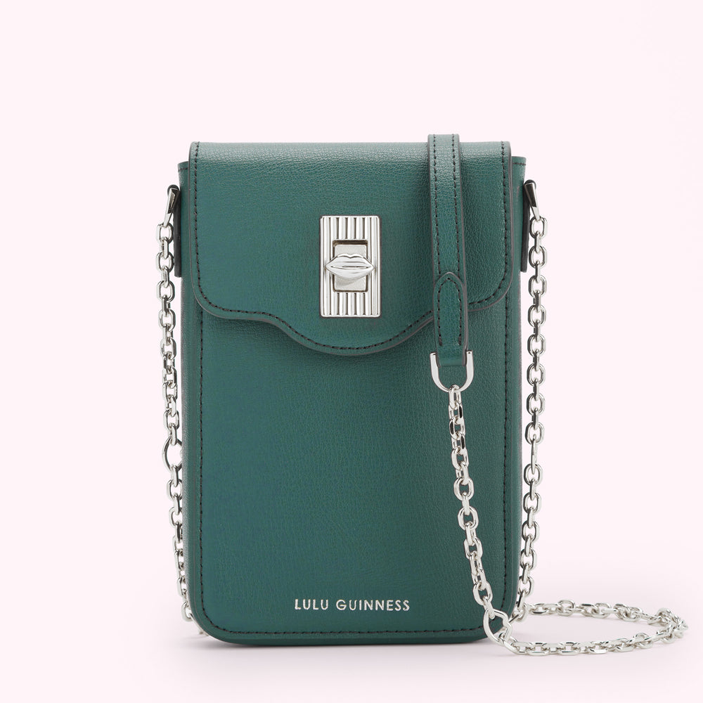 Dark teal Lulu Guinness crossbody bag with silver chain strap and lip-shaped clasp.
