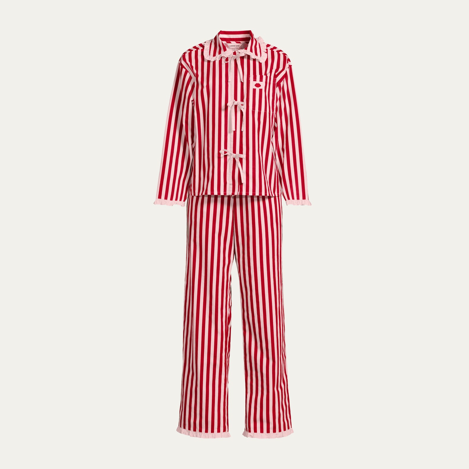 Red and pink striped pajama set on a light gray background