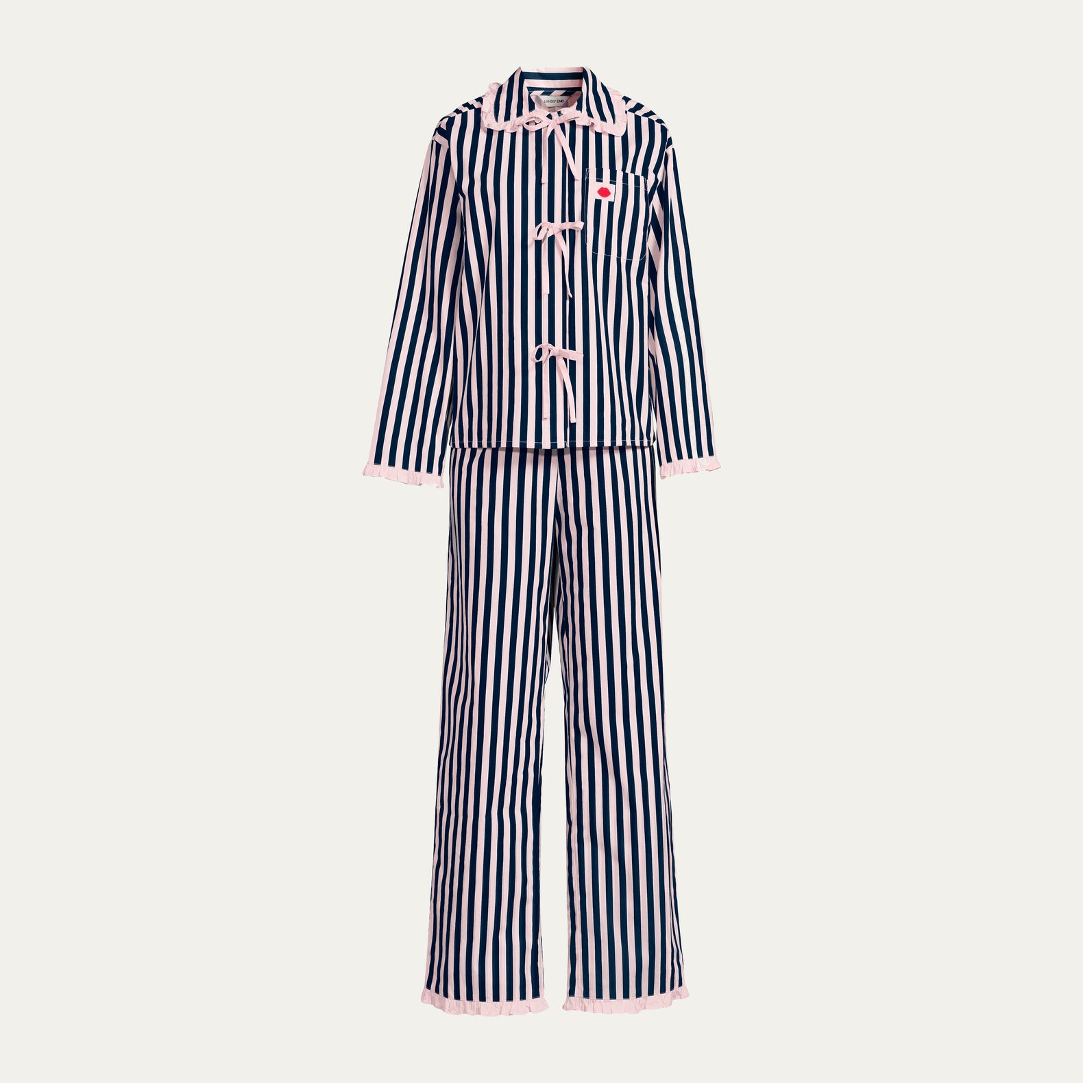 Navy and pale pink striped pajama set on a light gray background