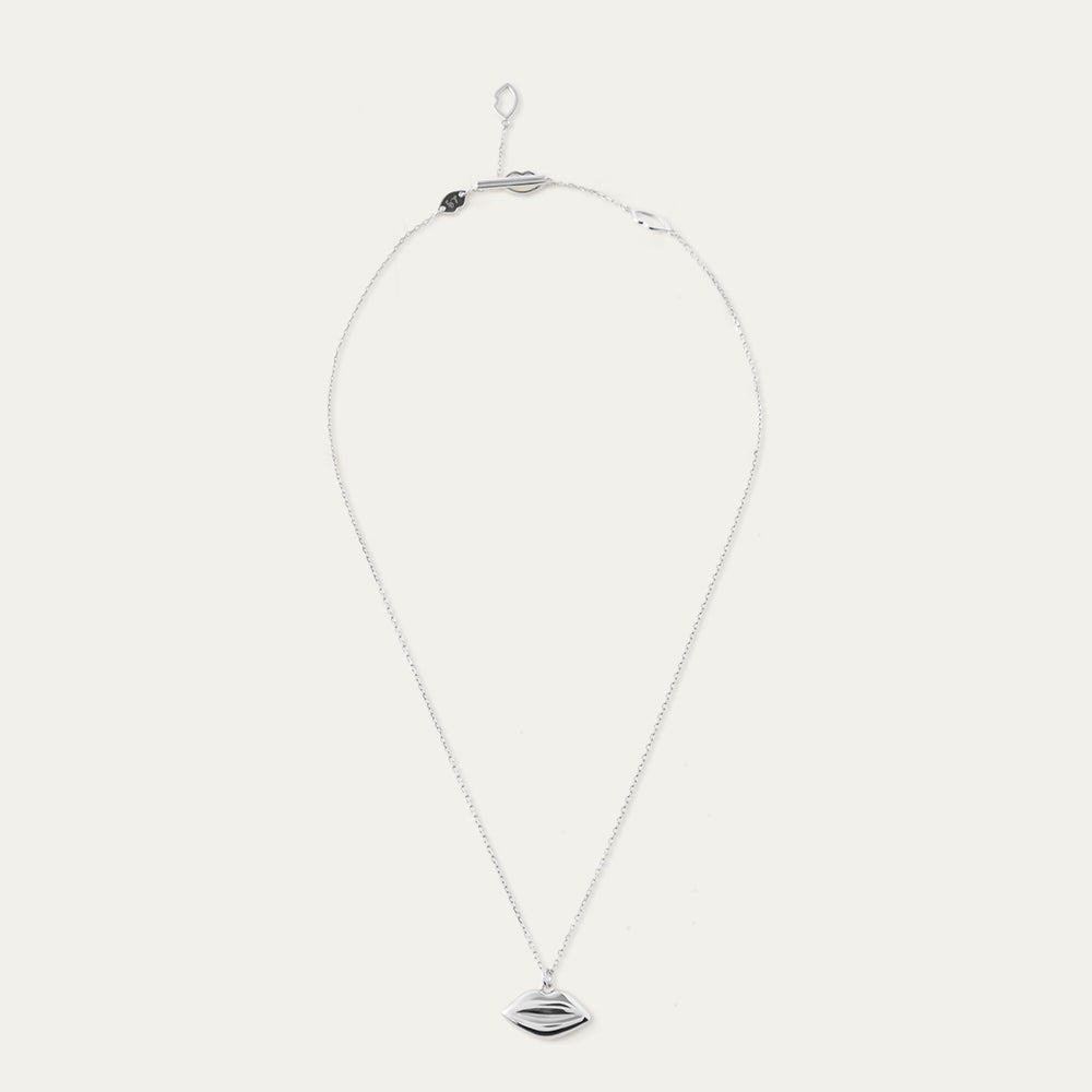 Silver necklace with a lip-shaped pendant on a white background