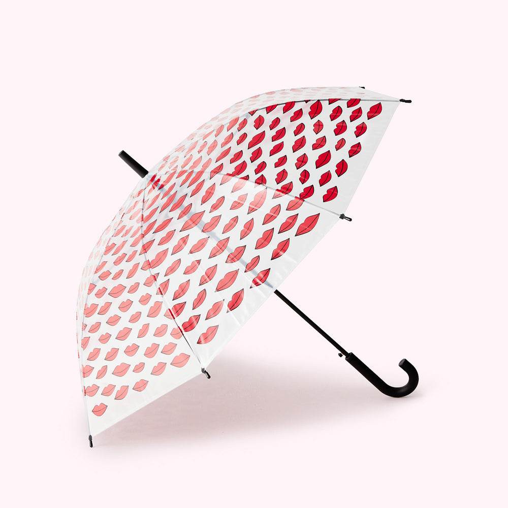 Clear umbrella with a red lips print.