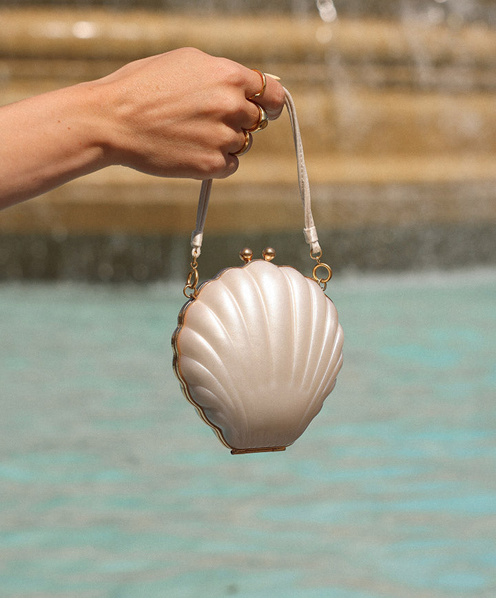 Lulu guinness best sale ivory shell clutch