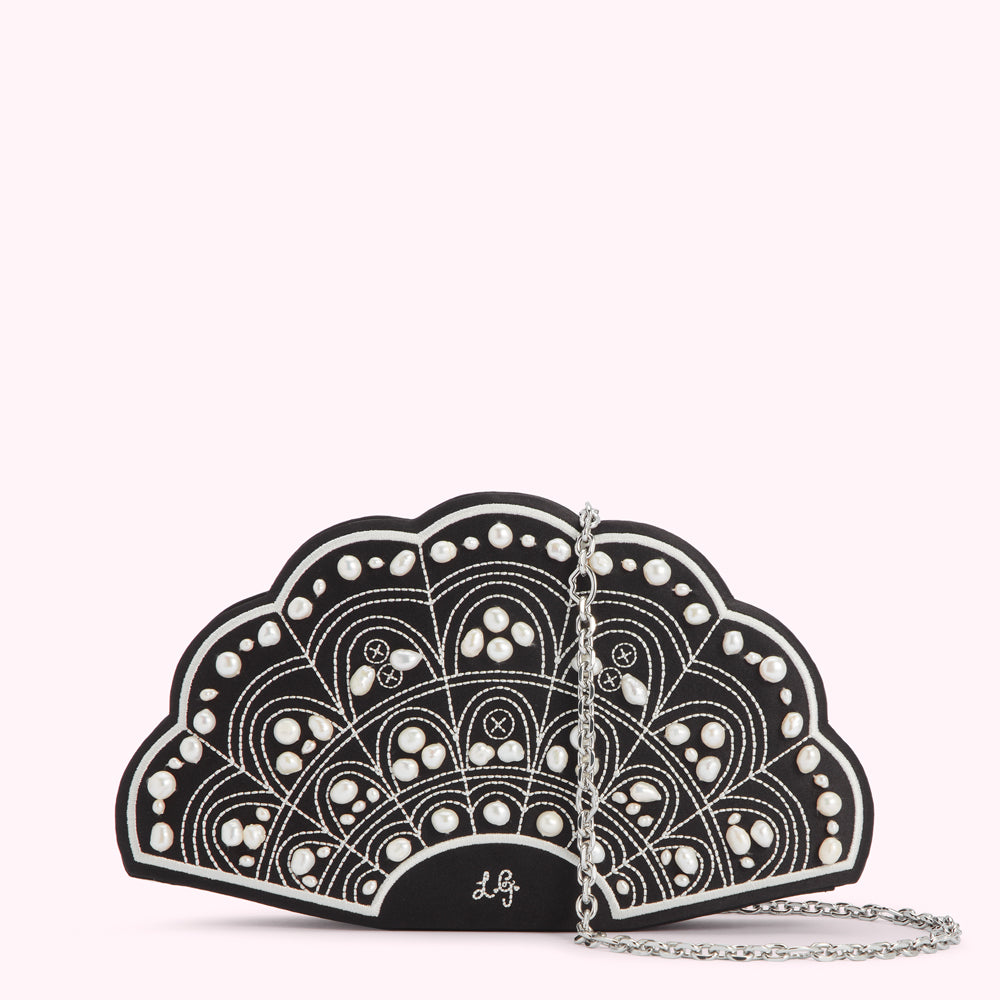 Black fan-shaped clutch embellished with white pearls and embroidery, silver chain strap.